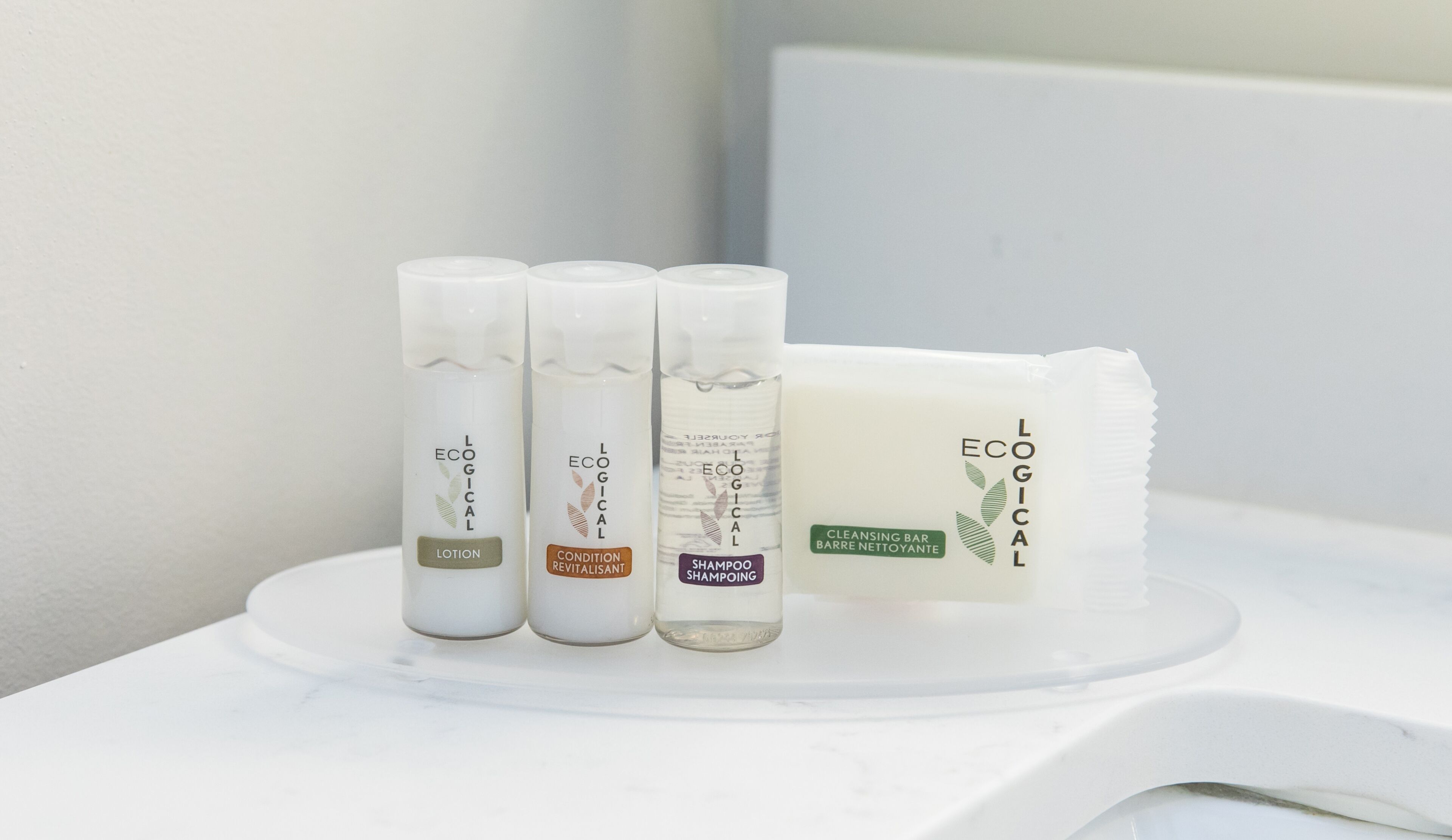 eco-friendly toiletries, hair dryer, towels