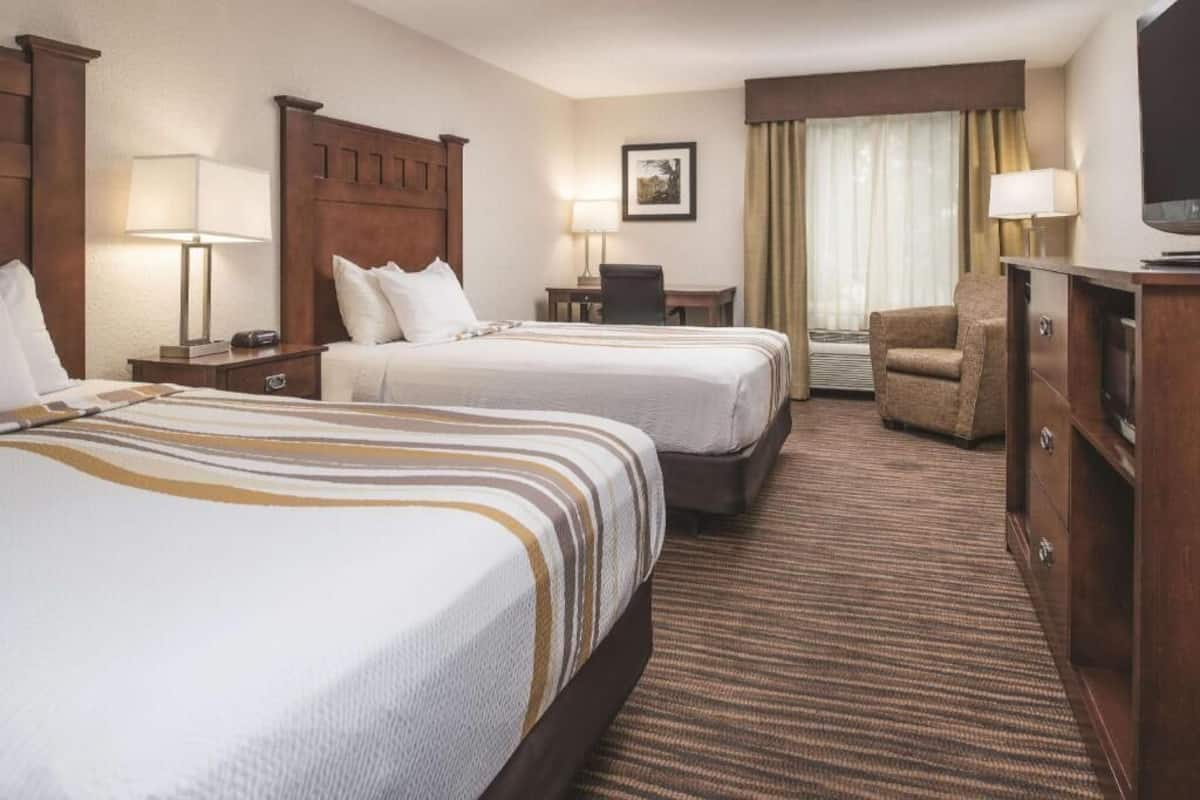Premium bedding, pillowtop beds, desk, blackout drapes