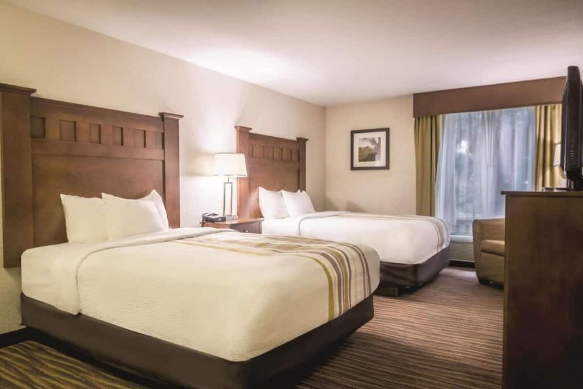 Premium bedding, pillowtop beds, desk, blackout drapes