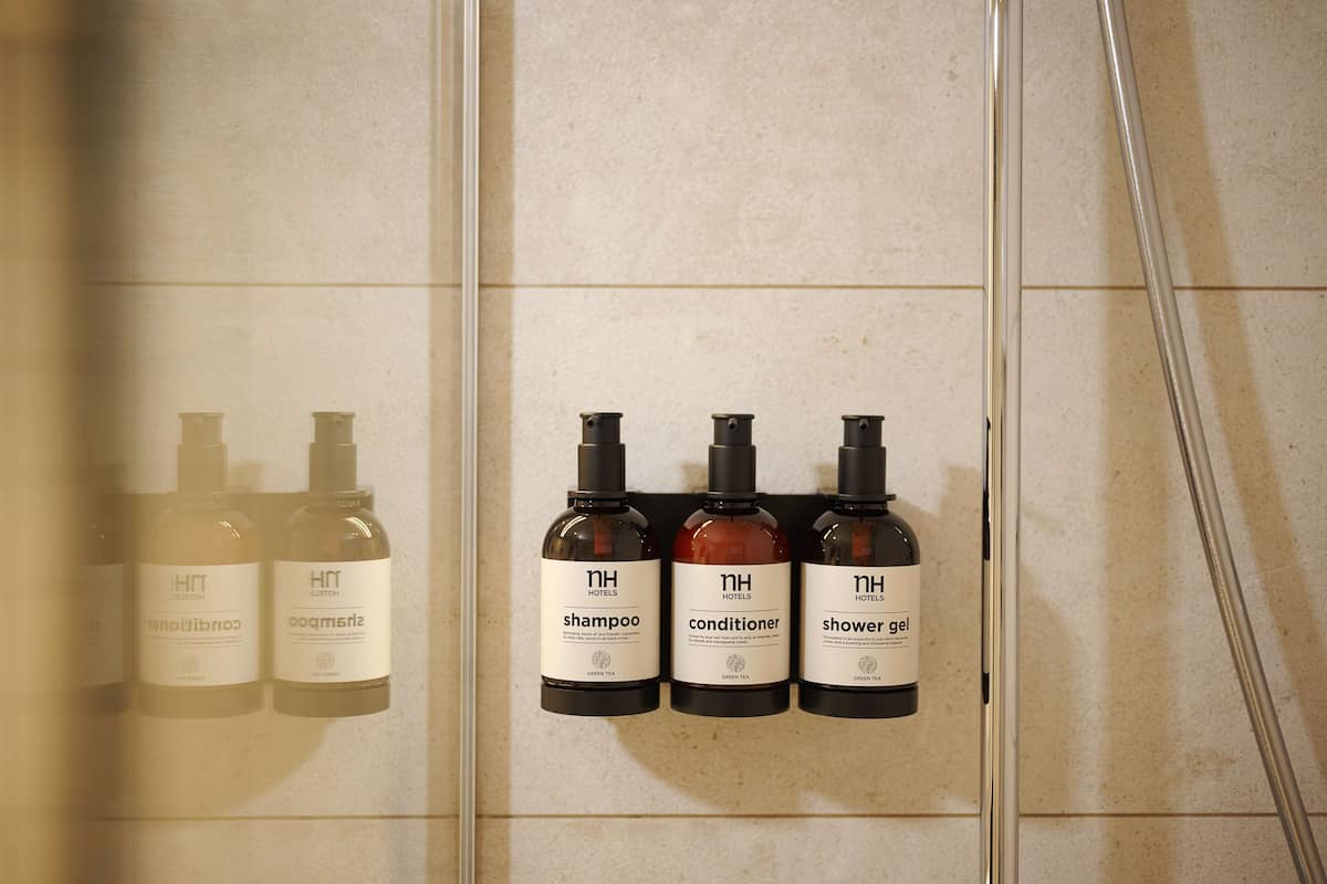 shower, eco-friendly toiletries, hair dryer, towels