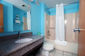 Separate bathtub and shower, designer toiletries, hair dryer