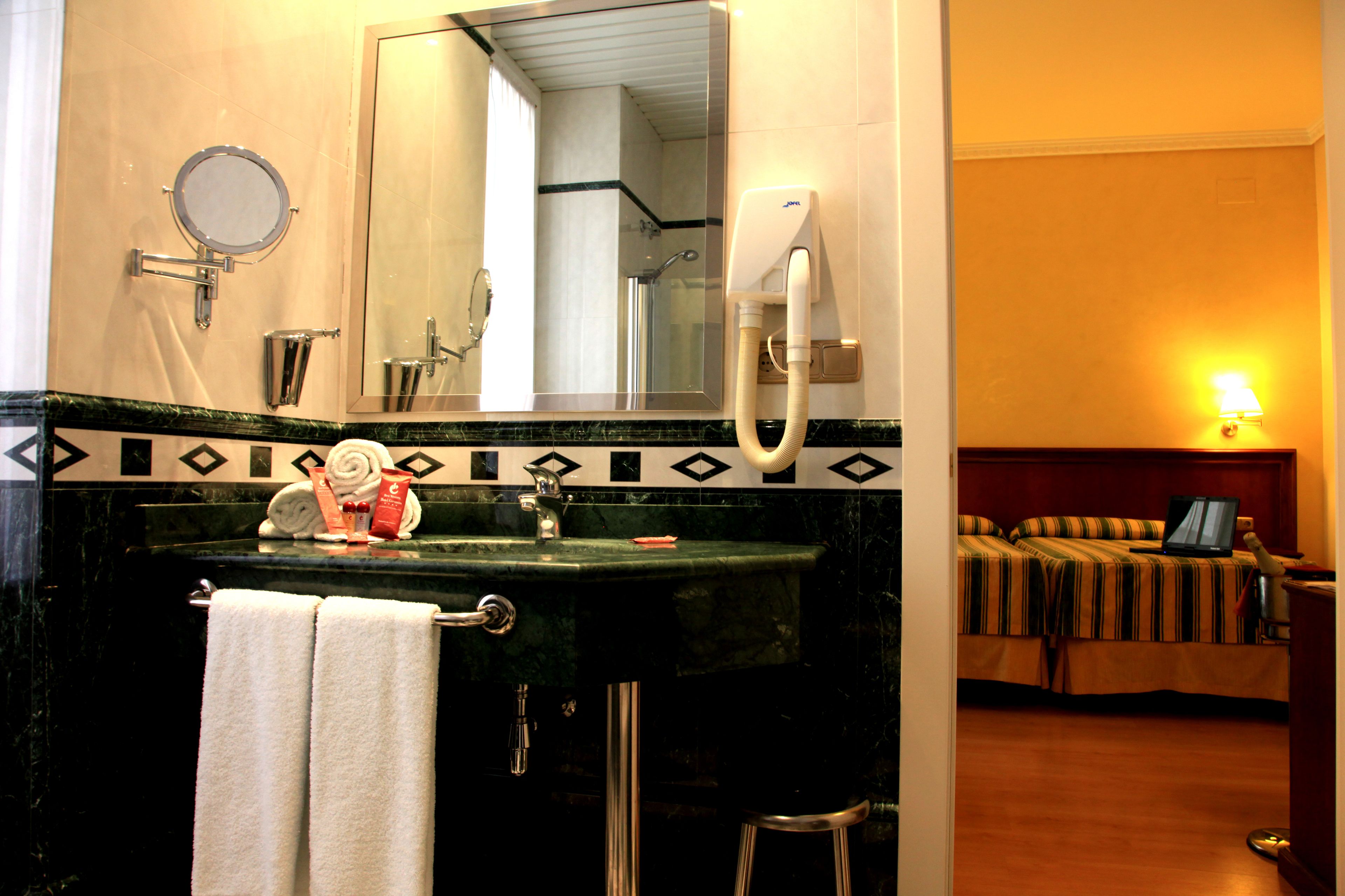 bathtub, free toiletries, hair dryer, bidet