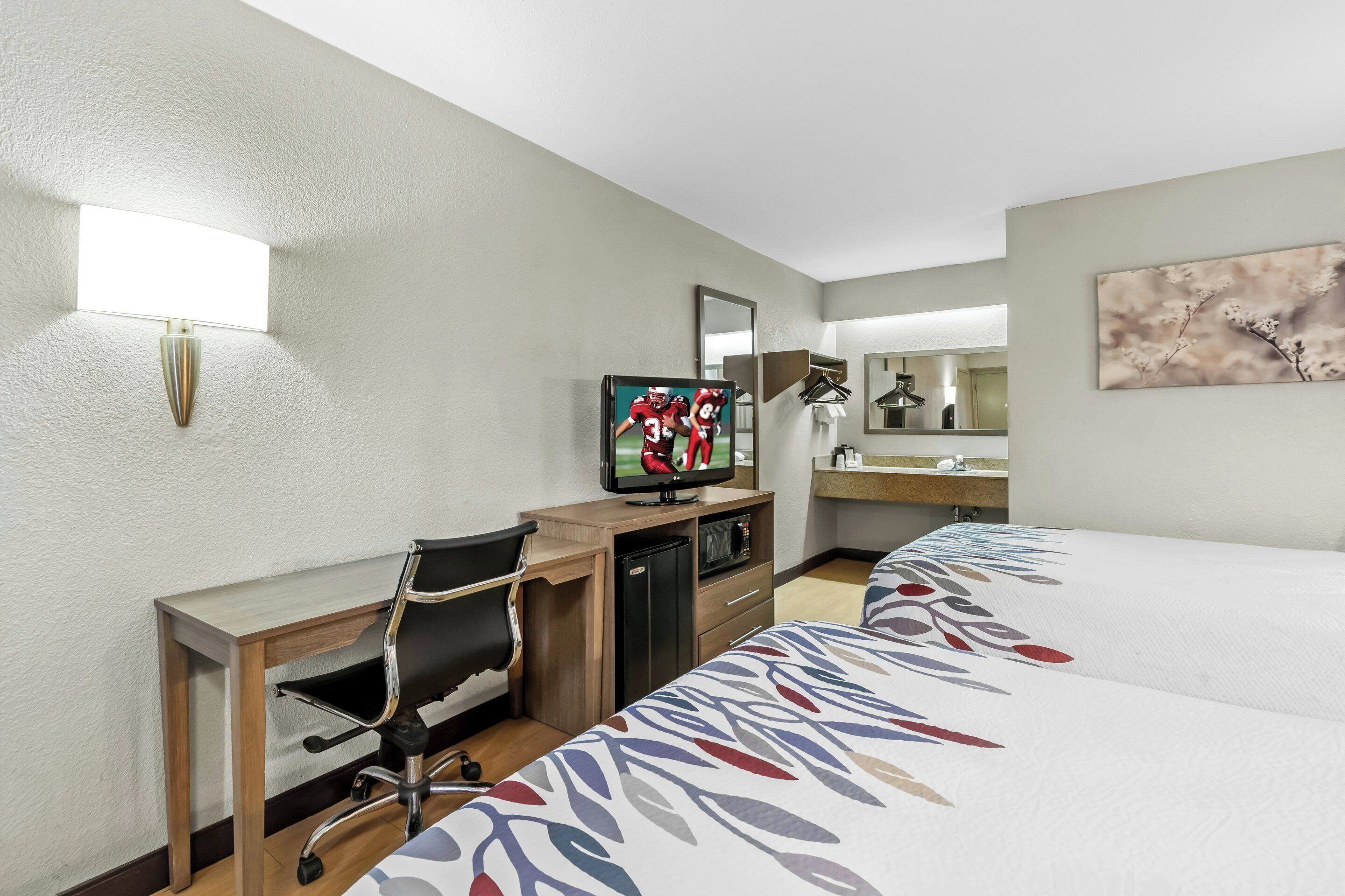 Desk, blackout curtains, free WiFi, bed sheets