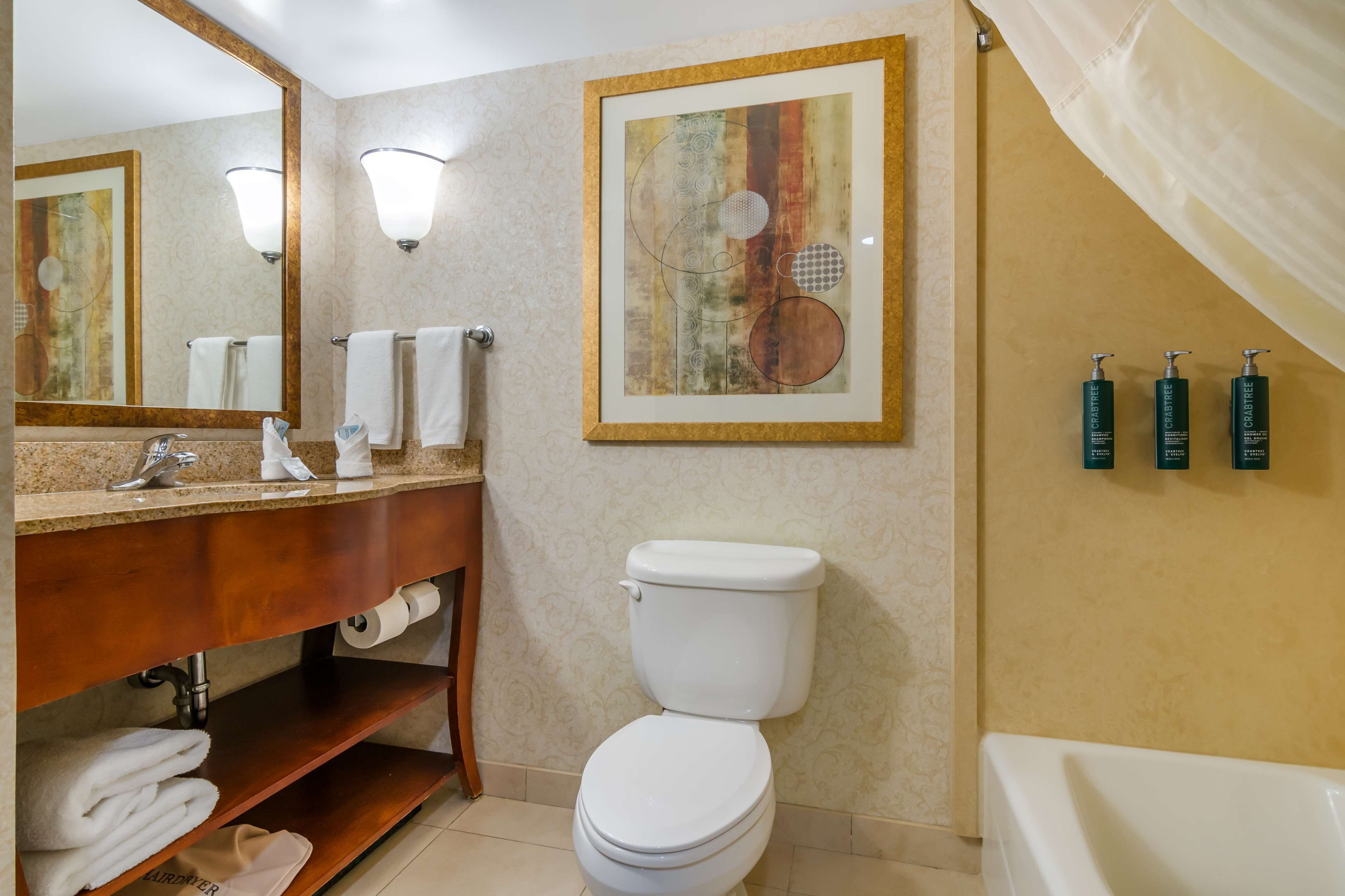 one king bed non smoking | bathroom | combined shower/bathtub, designer toiletries, hair dryer, towels