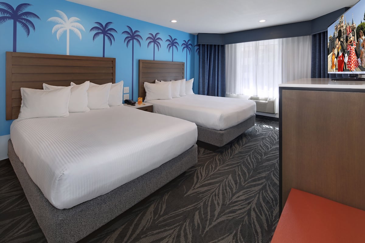 standard room, 2 queen beds | in-room safe, iron/ironing board, free cots/infant beds, free wifi