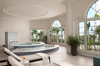Couples treatment rooms, sauna, hot tub, steam room, body treatments at The Ritz-Carlton, Naples