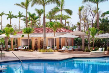 2 outdoor pools, pool umbrellas, sun loungers at The Ritz-Carlton, Naples