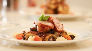 A plate of food with sliced meat, vegetables, and a garnish. - ibis Styles Karratha (Karratha)