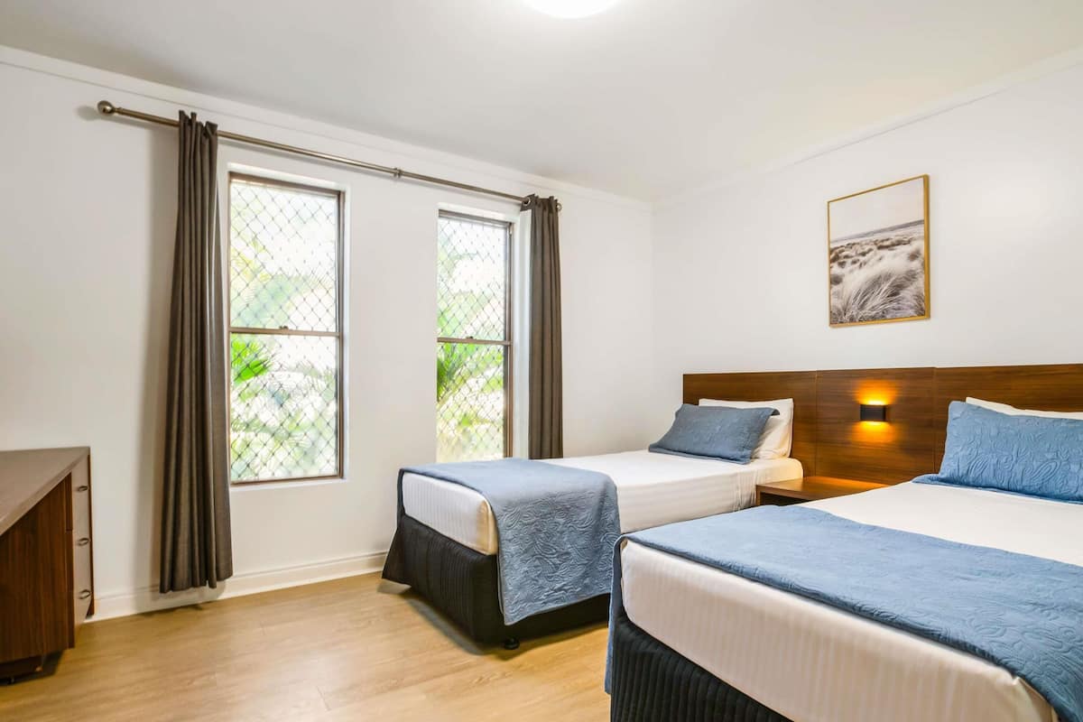 Family Room, Multiple Beds | Minibar, desk, soundproofing, iron/ironing board