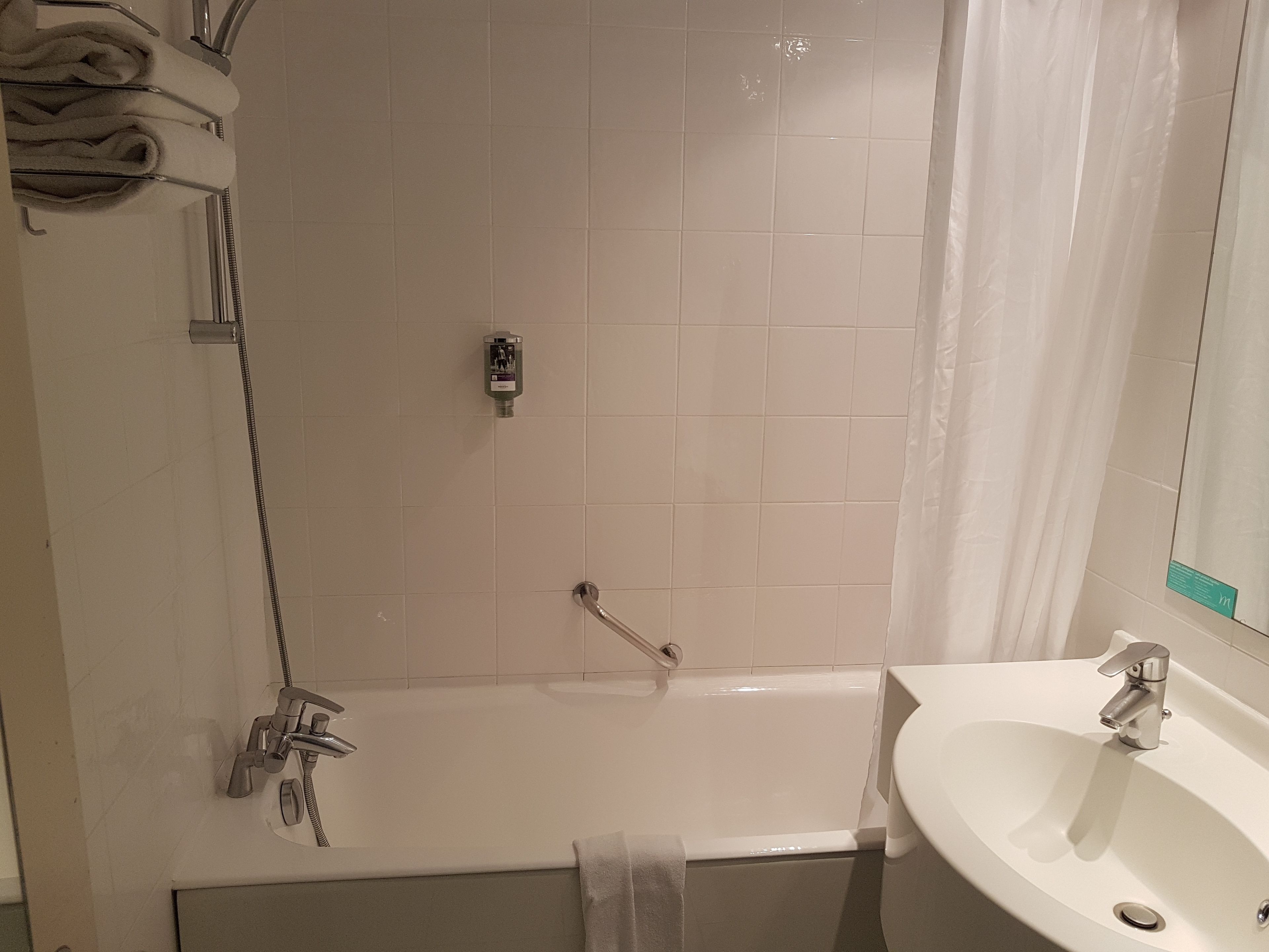 eco-friendly toiletries, hair dryer, towels