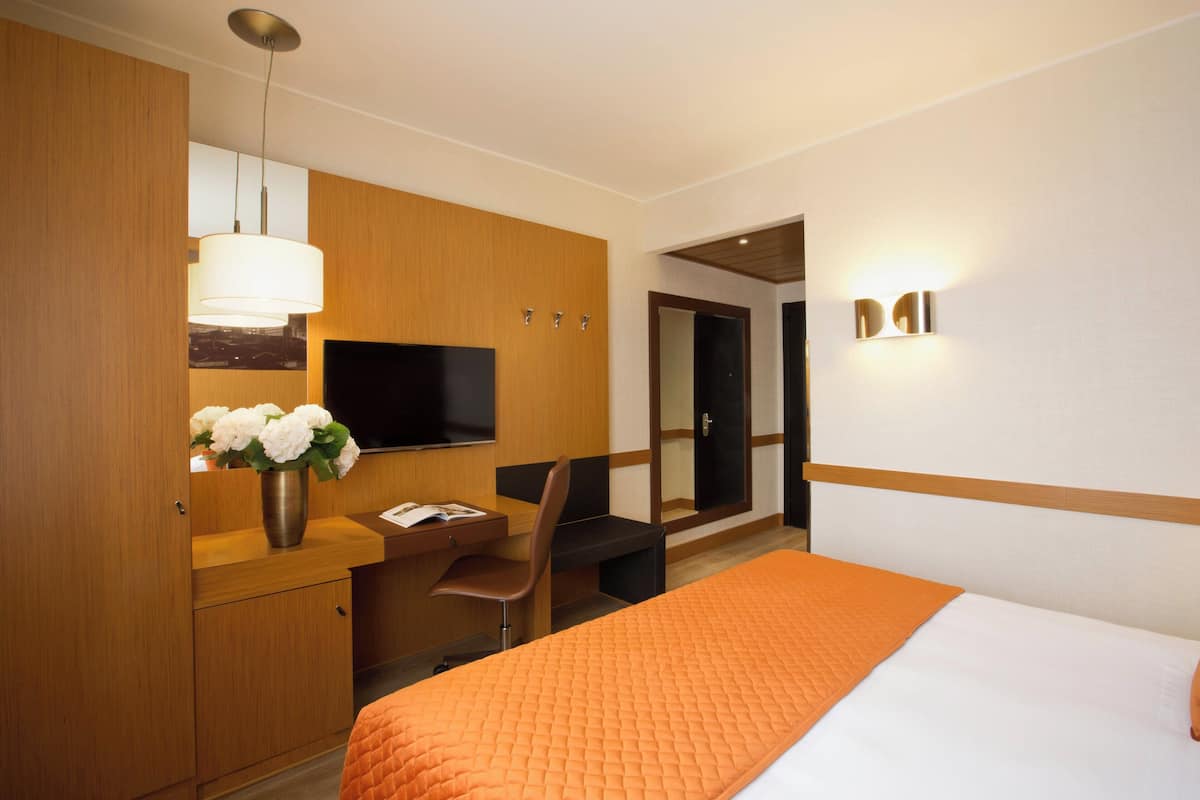 Ropa de cama de alta calidad y minibar
