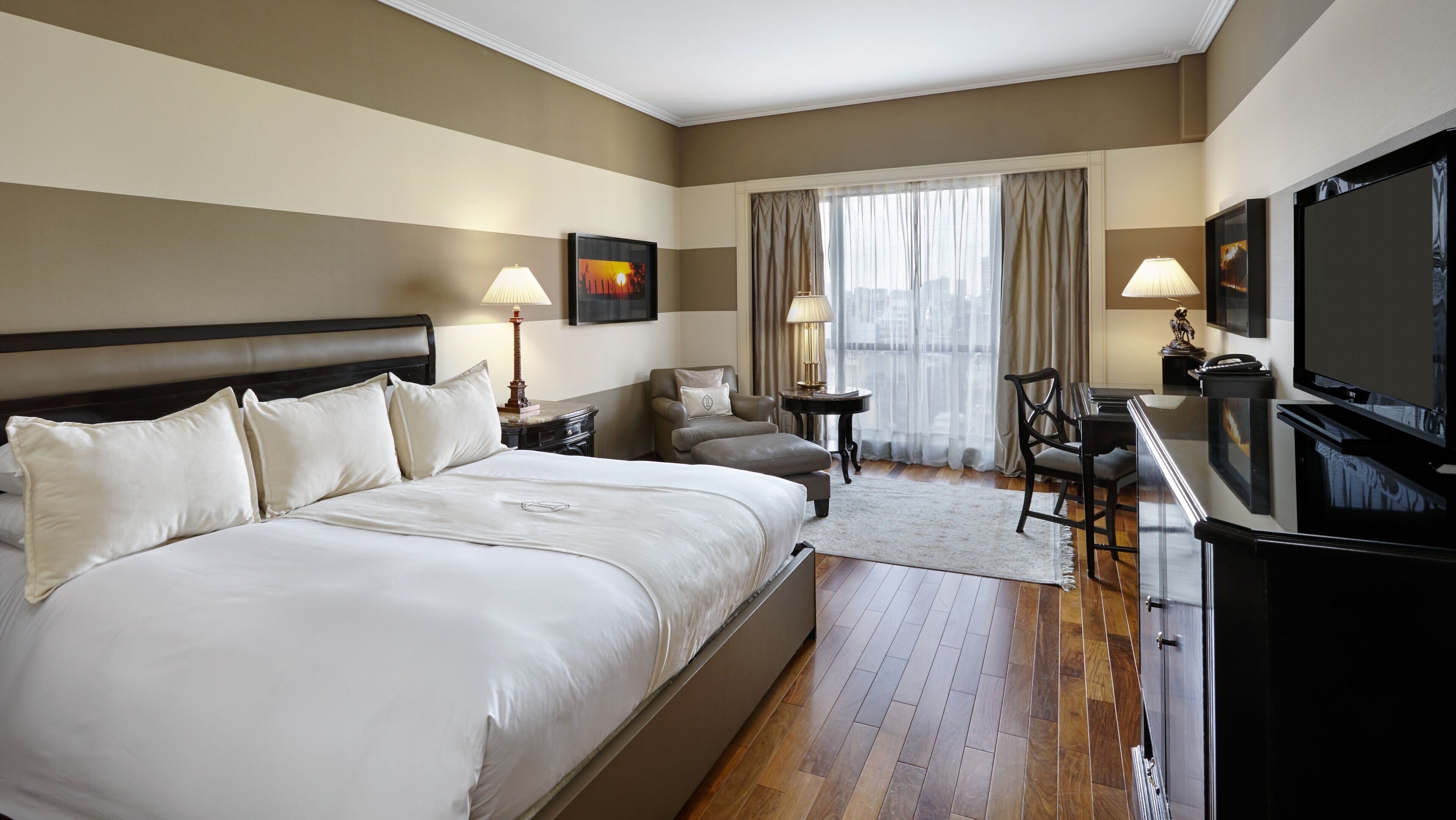 Premium bedding, pillow-top beds, minibar, in-room safe