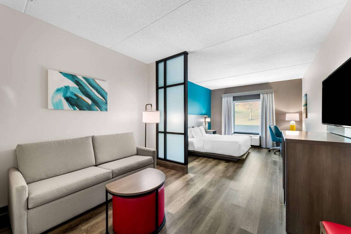 premium bedding, desk, blackout curtains, iron/ironing board