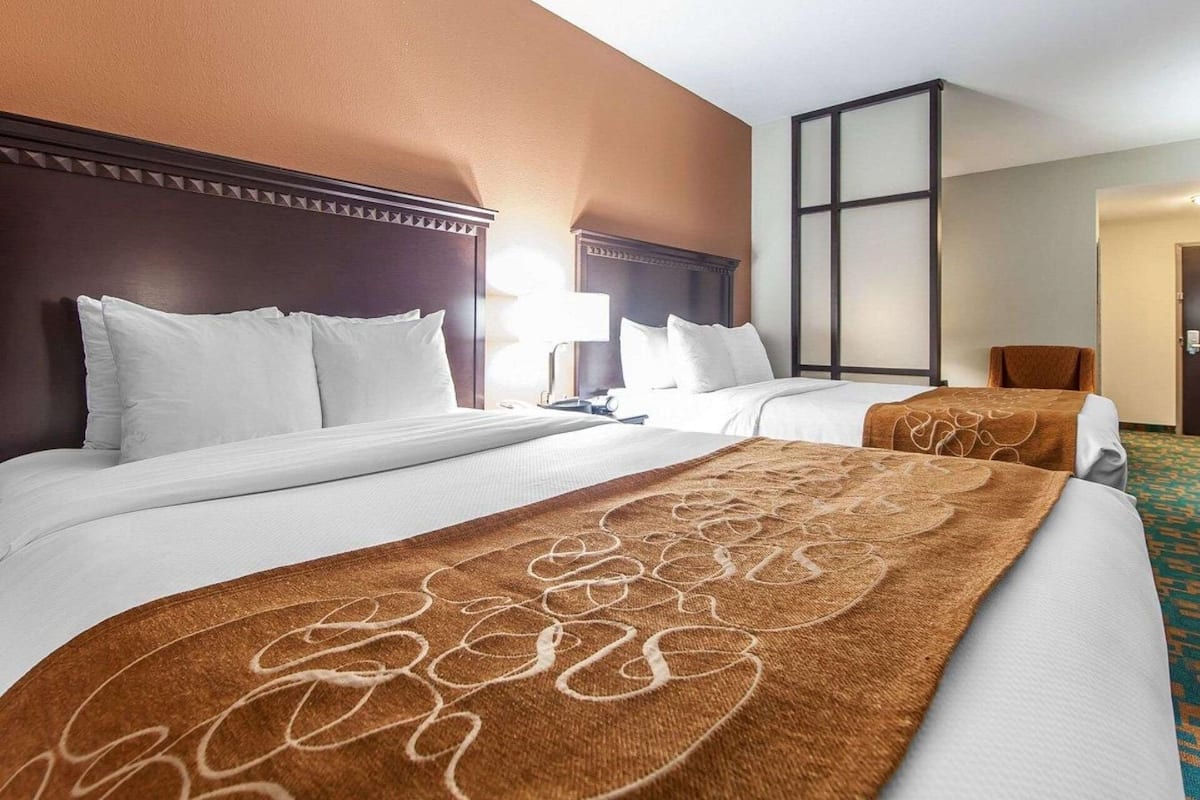 Premium bedding, desk, blackout drapes, iron/ironing board