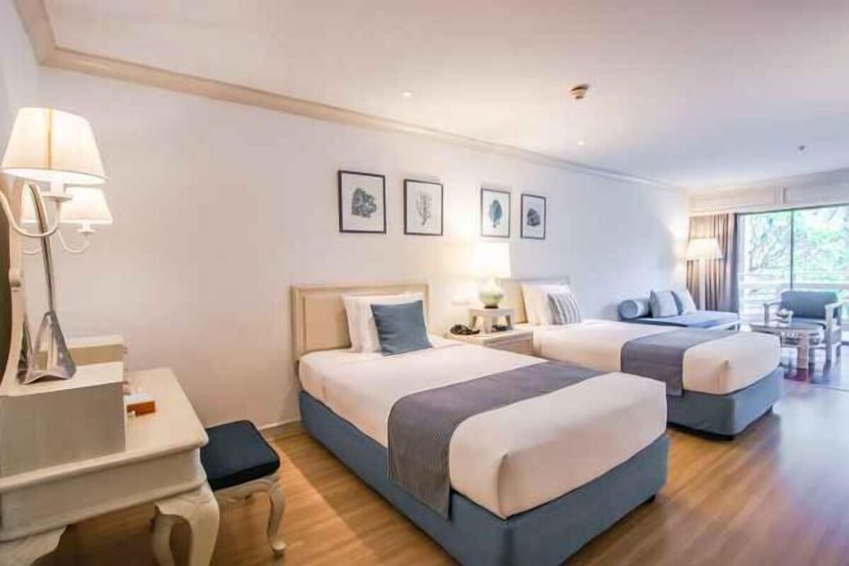 In-room safe, desk, blackout curtains, iron/ironing board (on request)