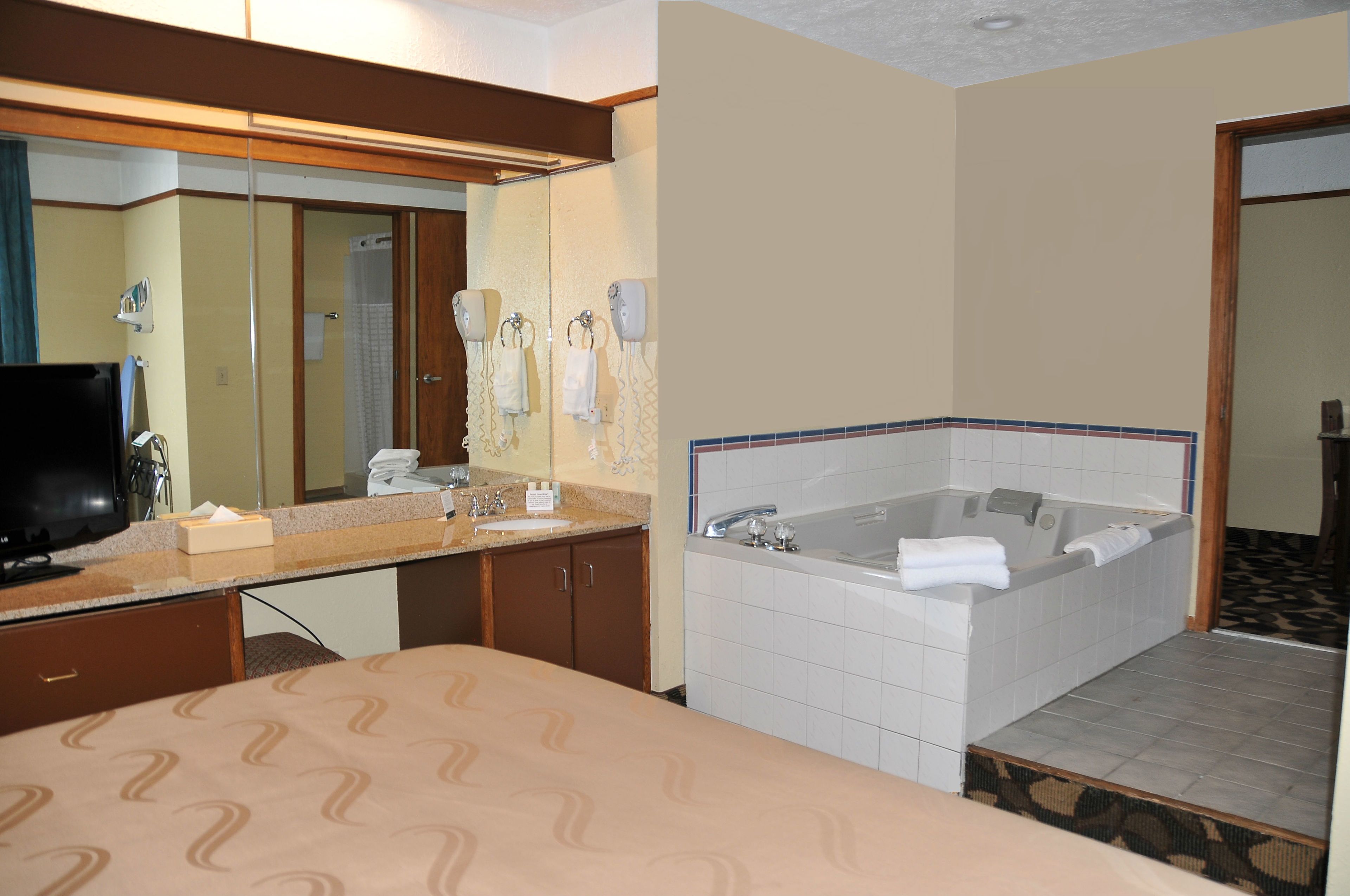 standard suite, 1 king bed with sofa bed, non smoking, jetted tub | jetted bathtub