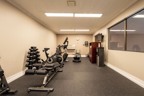 A gym with various exercise equipment, a treadmill, and a stationary bike. - Quality Inn Paradise Creek Pullman (Pullman)