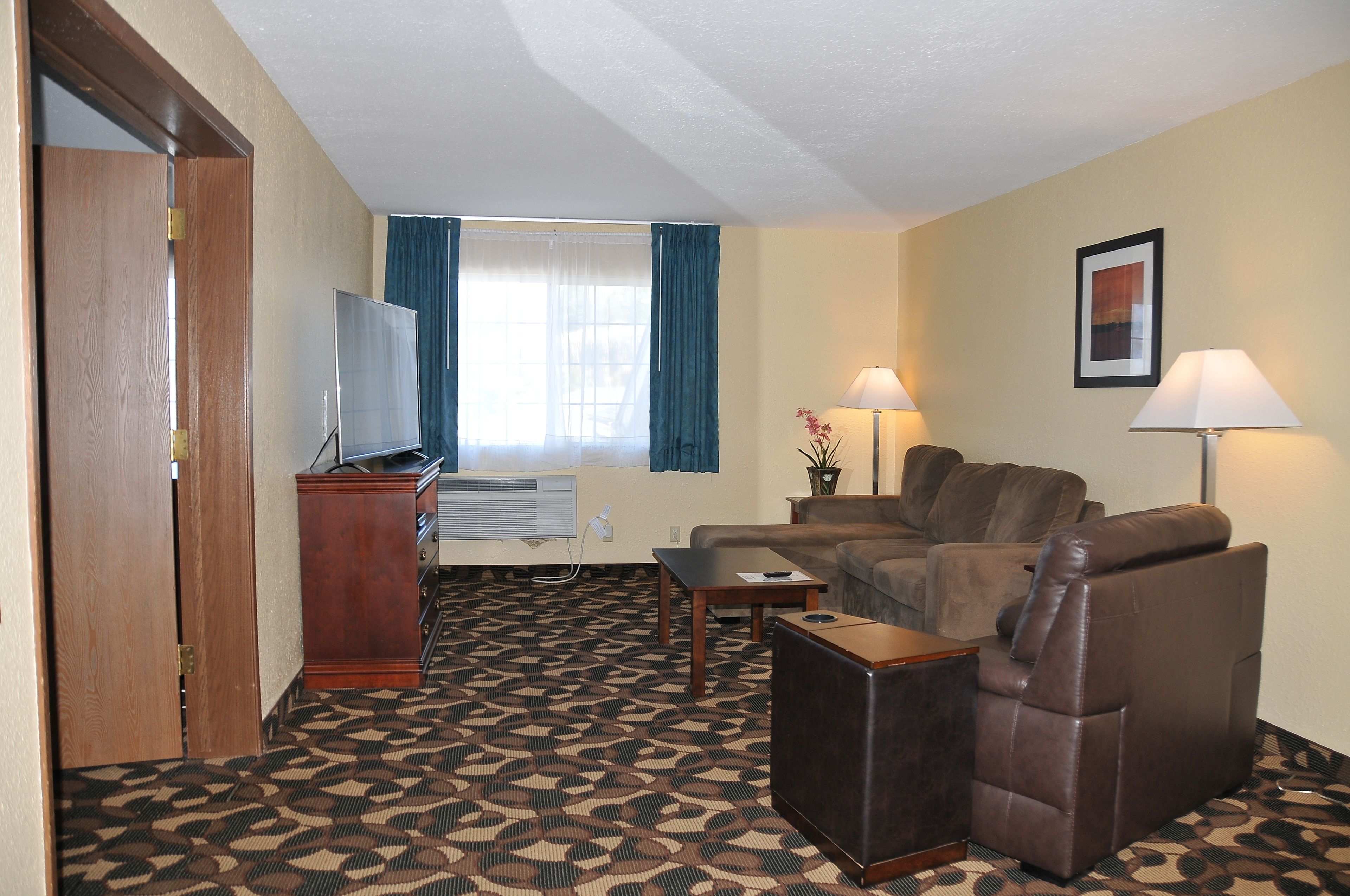 standard suite, 1 king bed with sofa bed, non smoking, jetted tub | in-room safe, iron/ironing board, free cots/infant beds