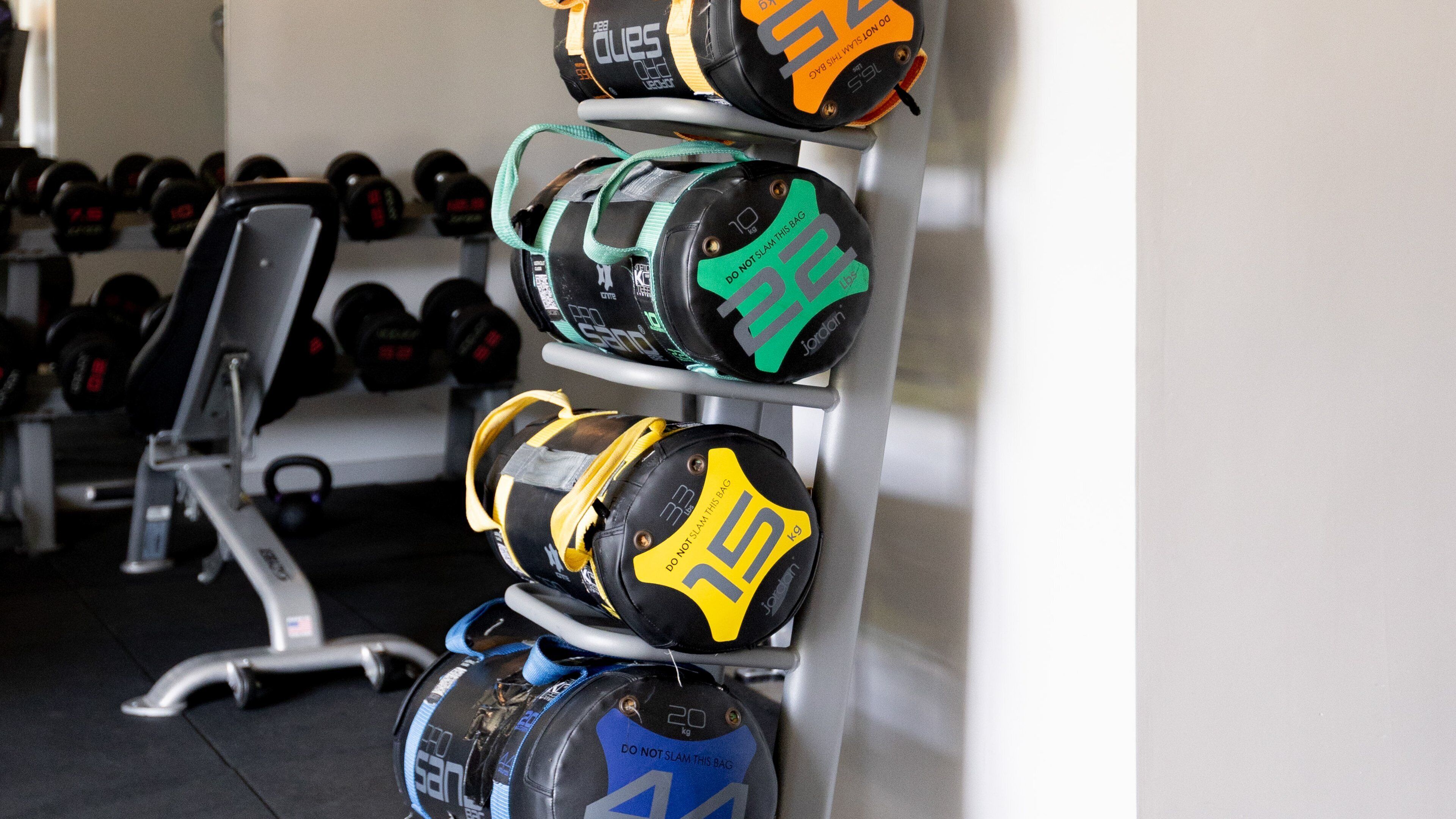 A rack of weightlifting equipment in a gym.