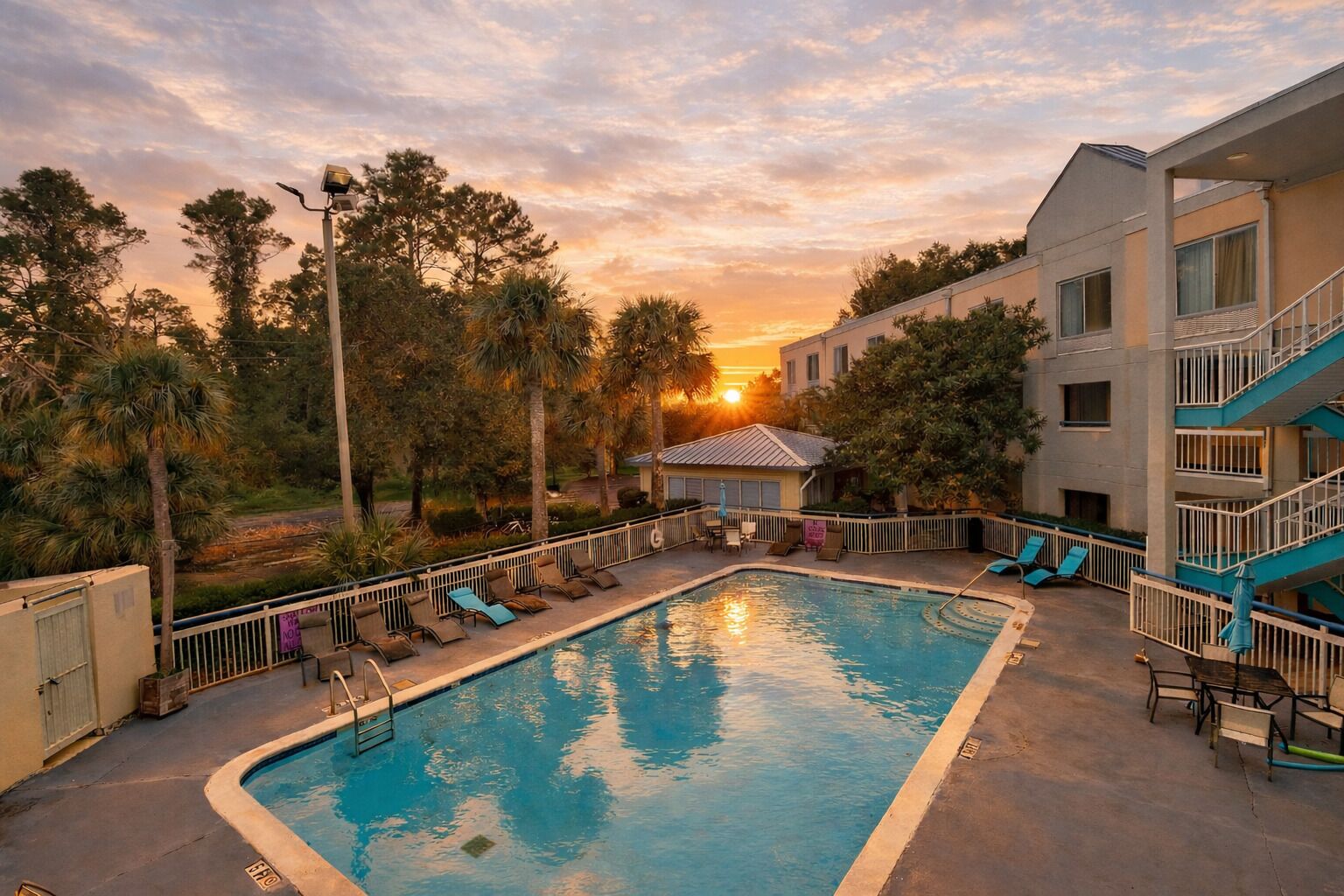 Outdoor pool, open 7:00 AM to 10:00 PM, pool umbrellas, sun loungers