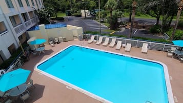 Outdoor pool, open 7:00 AM to 10:00 PM, pool umbrellas, pool loungers