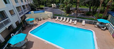 Outdoor pool, open 7:00 AM to 10:00 PM, pool umbrellas, sun loungers