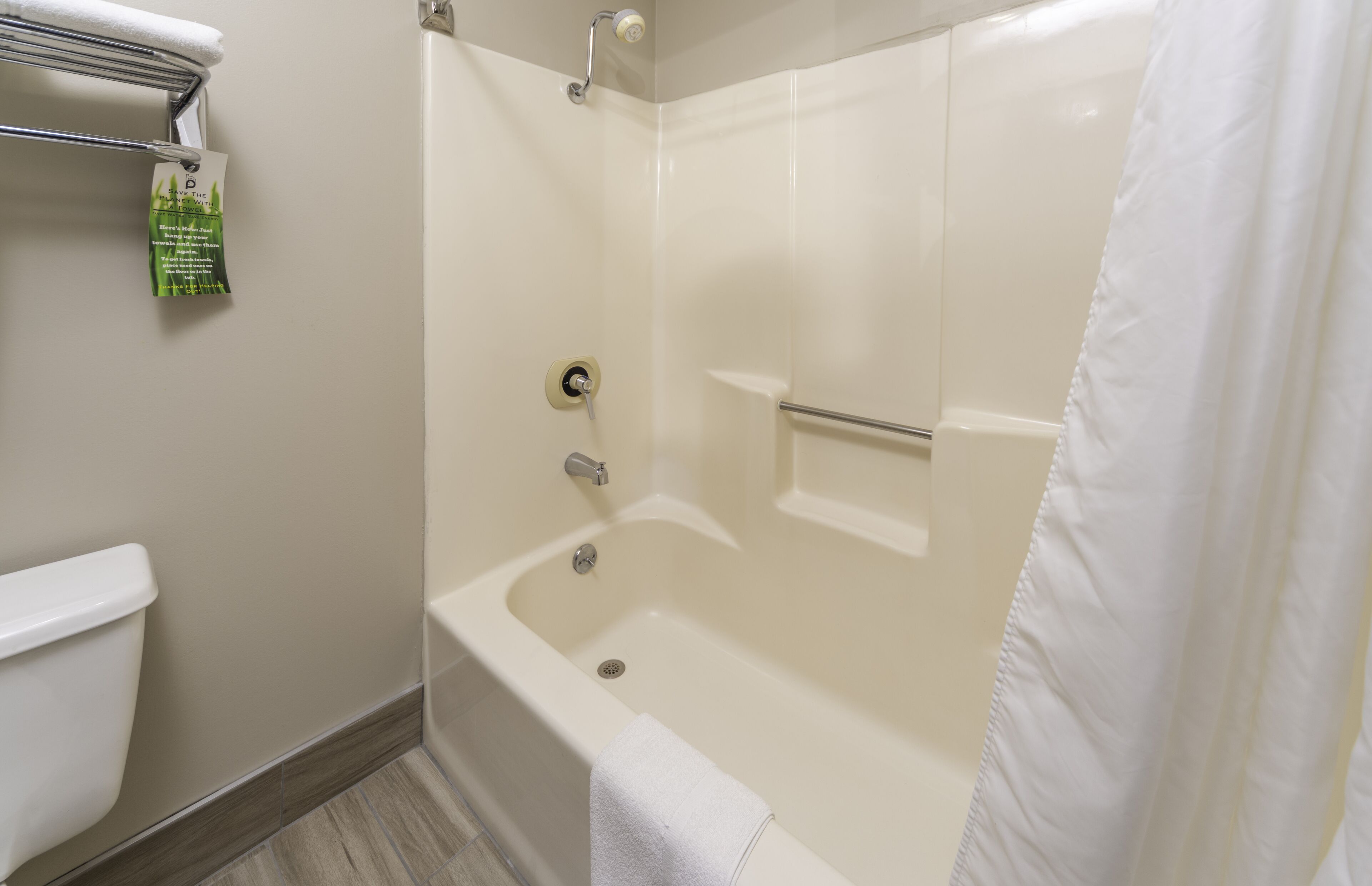 combined shower/bathtub, free toiletries, hair dryer, towels