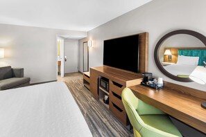 Hypo-allergenic bedding, desk, laptop workspace, blackout drapes