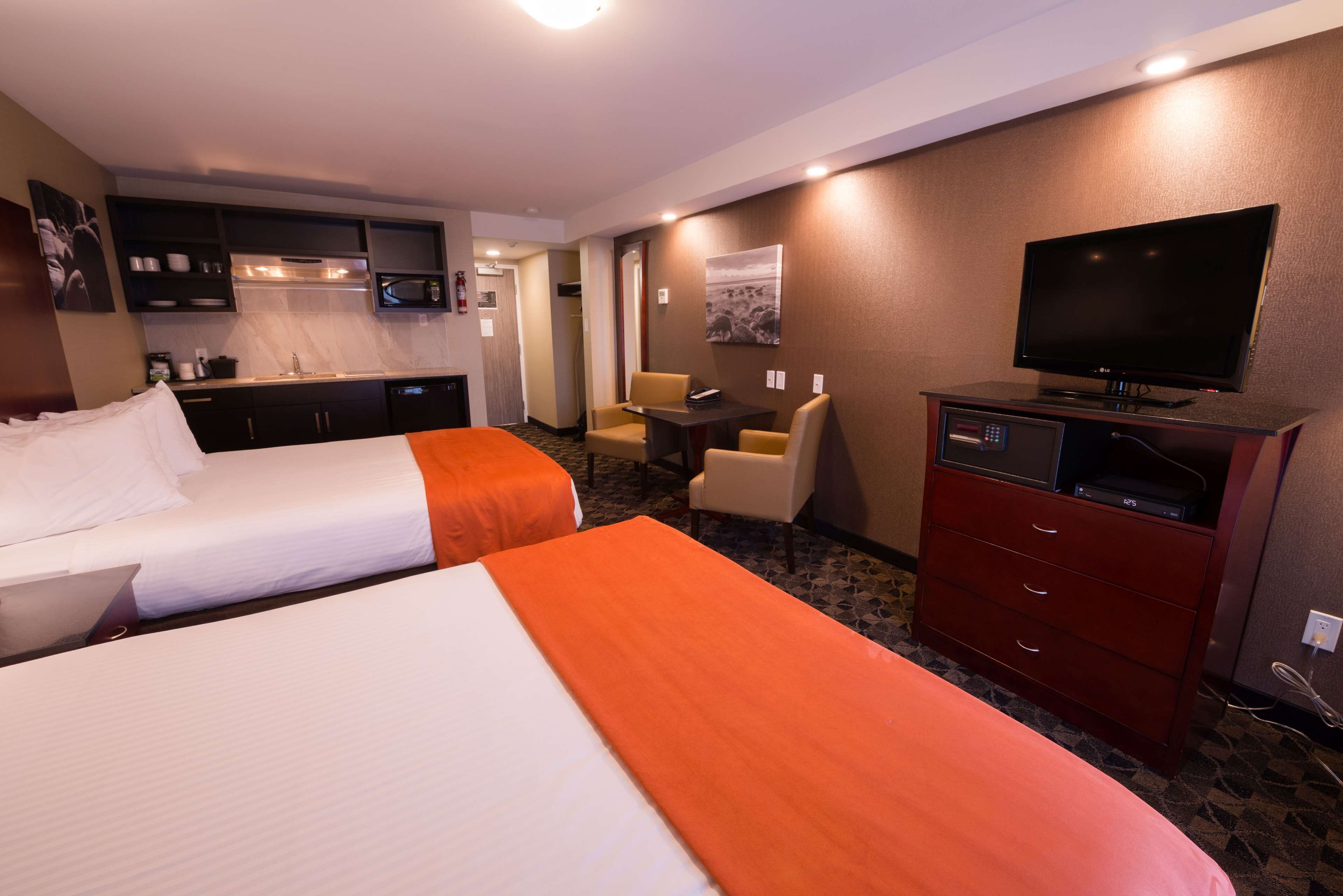 standard room, 2 queen beds, non smoking, balcony | in-room safe, blackout curtains, iron/ironing board, free wifi