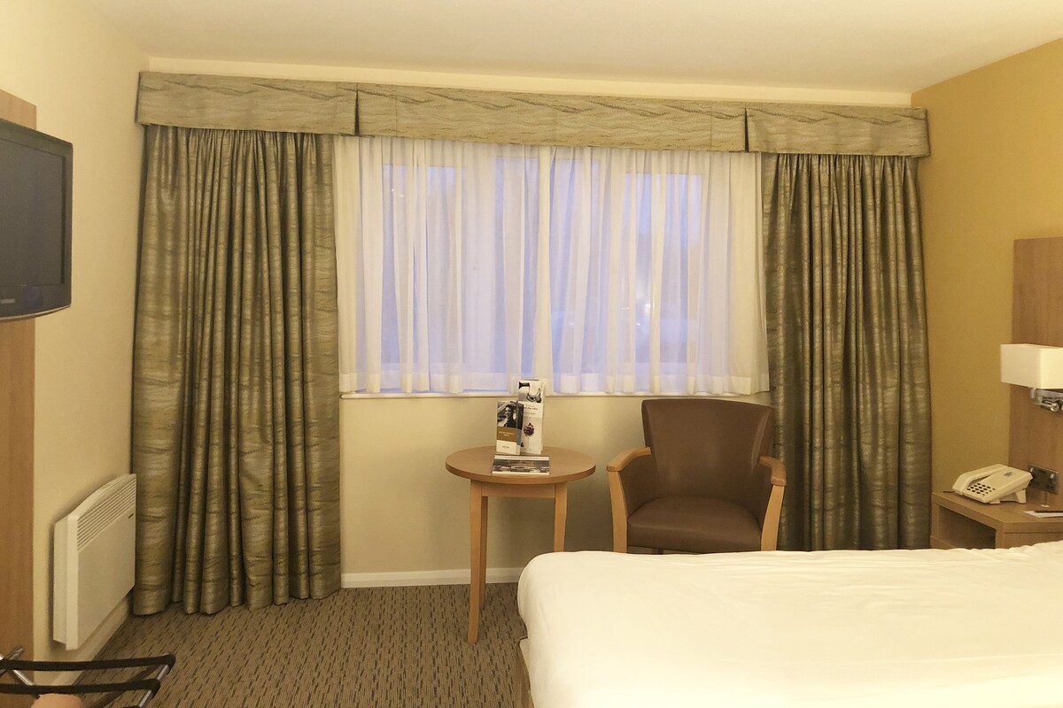 Desk, blackout drapes, iron/ironing board (on request), WiFi (free)