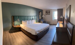 Desk, laptop workspace, iron/ironing board, free cots/infant beds