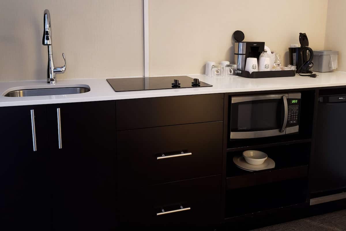 comfort room, 2 queen beds, kitchenette | room amenity