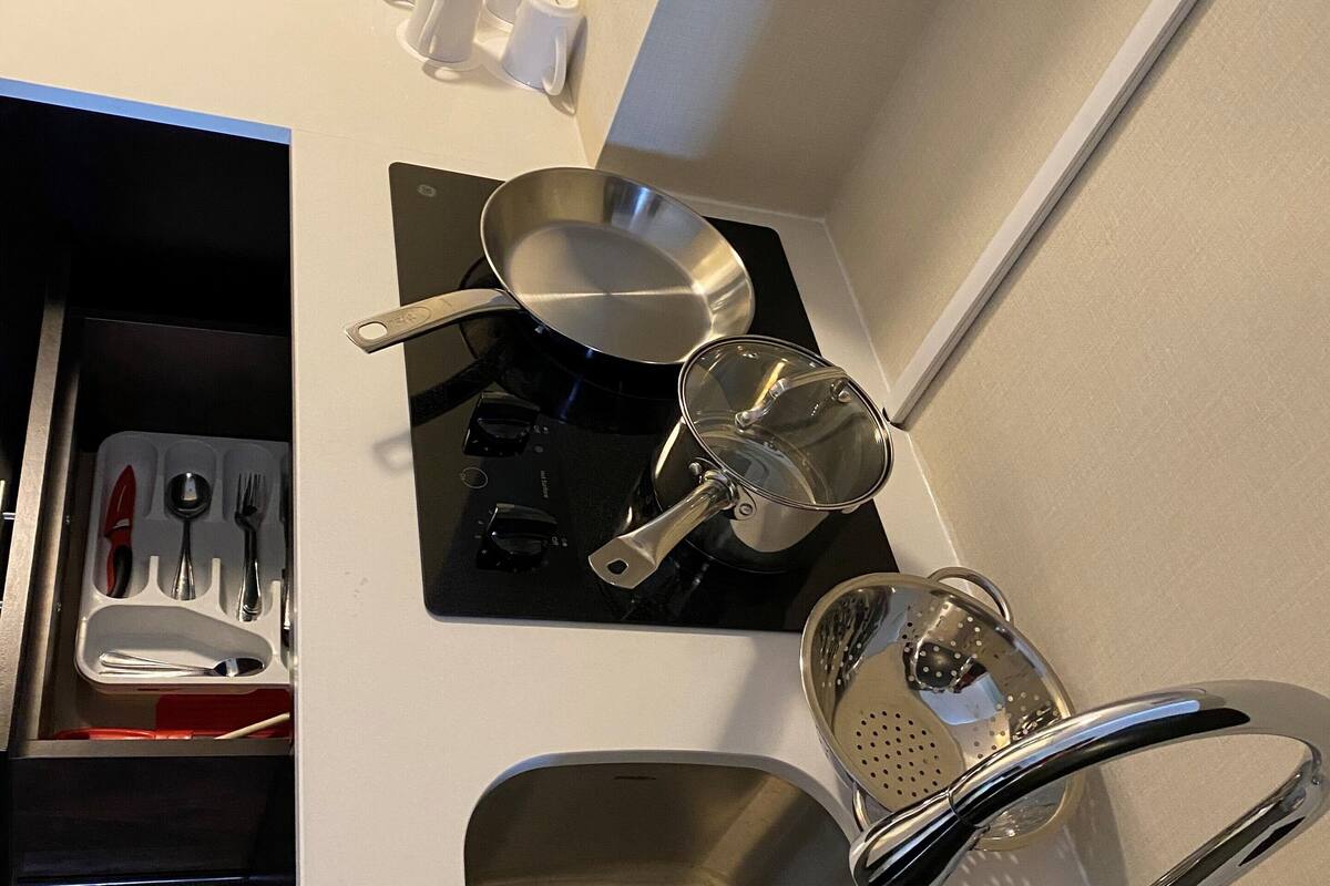 comfort room, 2 queen beds, kitchenette | private kitchenette | fridge, microwave, coffee/tea maker, electric kettle