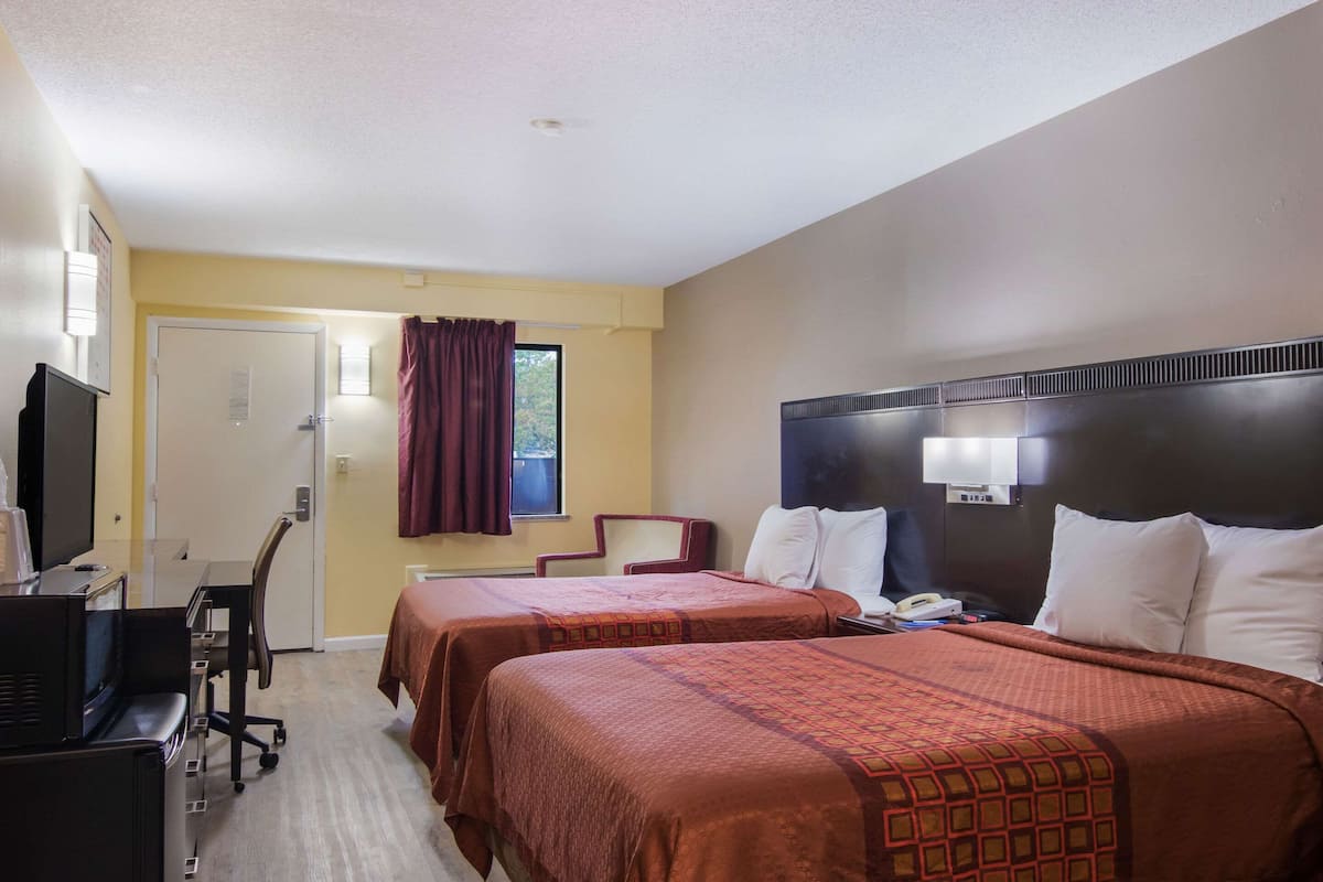 Desk, blackout curtains, cots/infant beds, rollaway beds