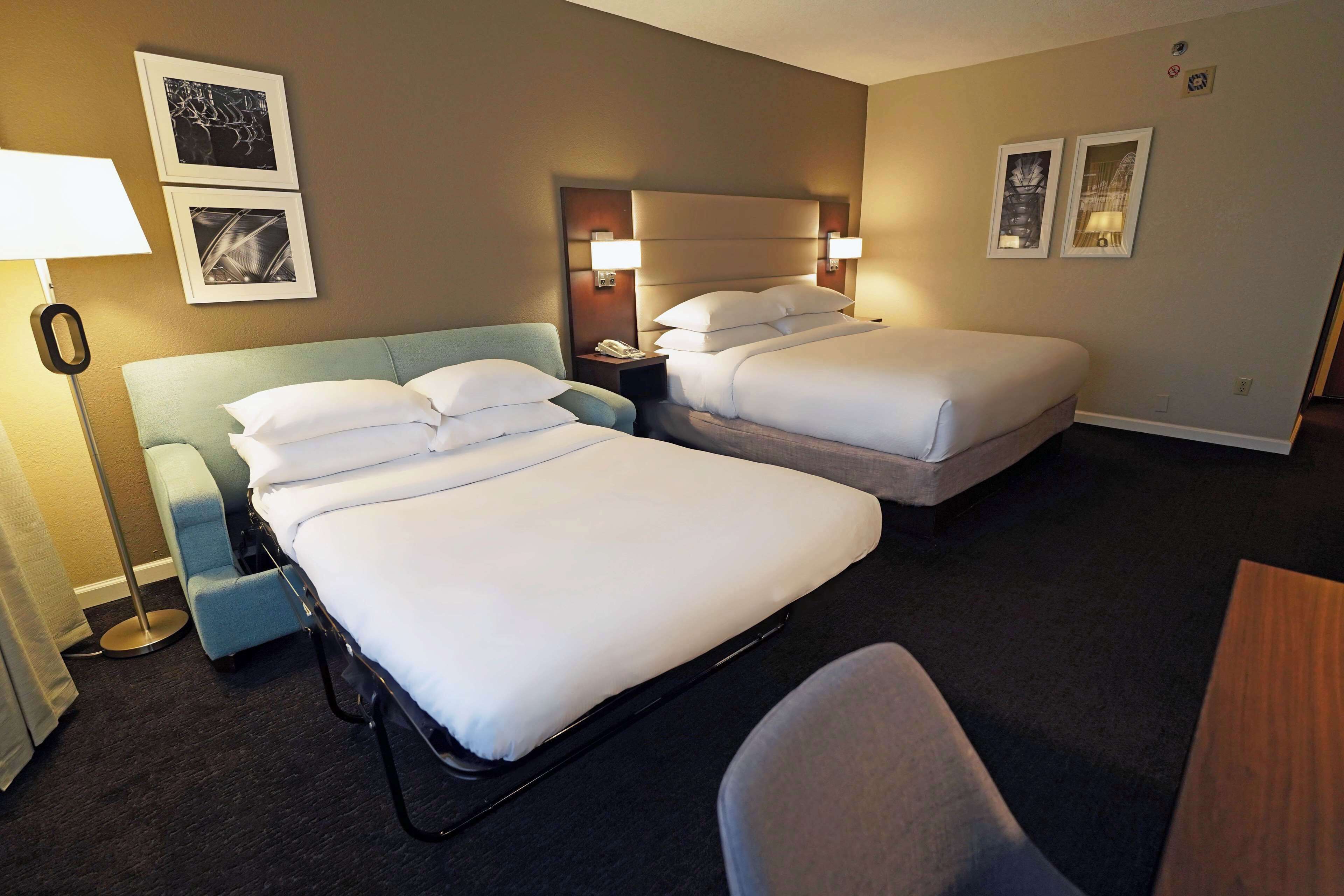 Room, 1 King Bed with Sofa bed | Pillowtop beds, in-room safe, desk, blackout drapes