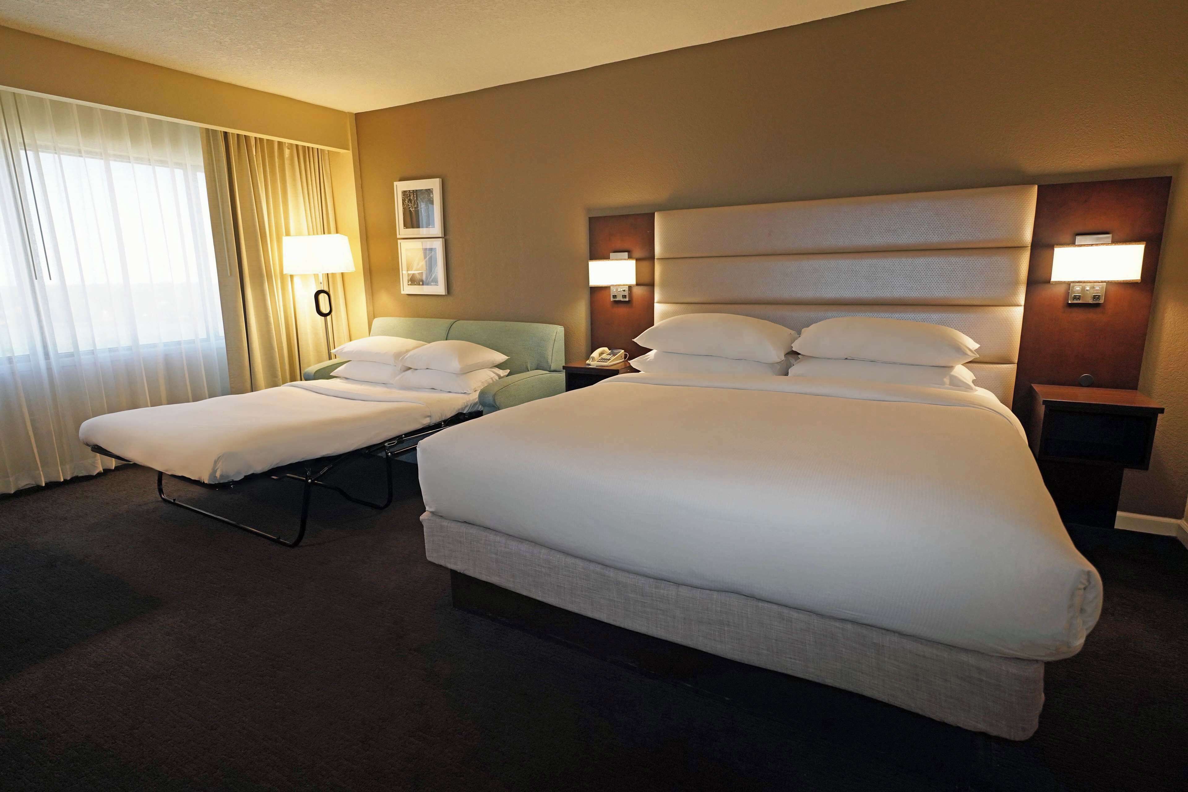 Room, 1 King Bed with Sofa bed | Pillowtop beds, in-room safe, desk, blackout drapes