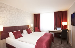 Hypo-allergenic bedding, in-room safe, desk, laptop workspace