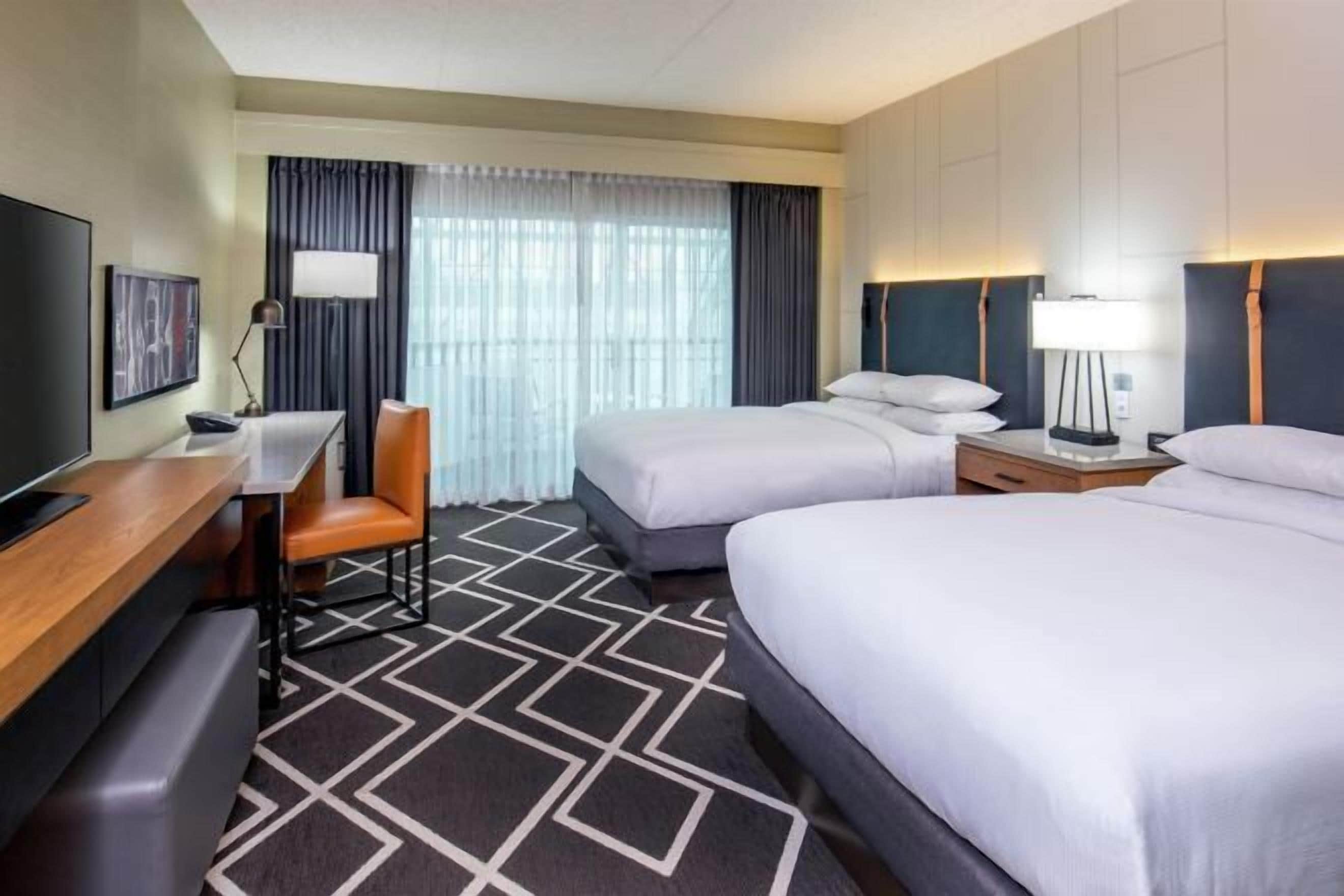 Premium bedding, pillow-top beds, in-room safe, desk