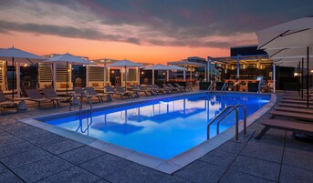 Seasonal outdoor pool, open 8:00 AM to 8:00 PM, cabanas (surcharge)