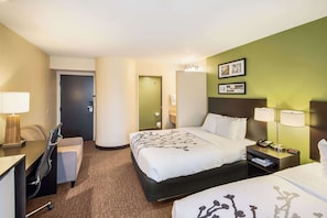 Hypo-allergenic bedding, desk, laptop workspace, blackout curtains