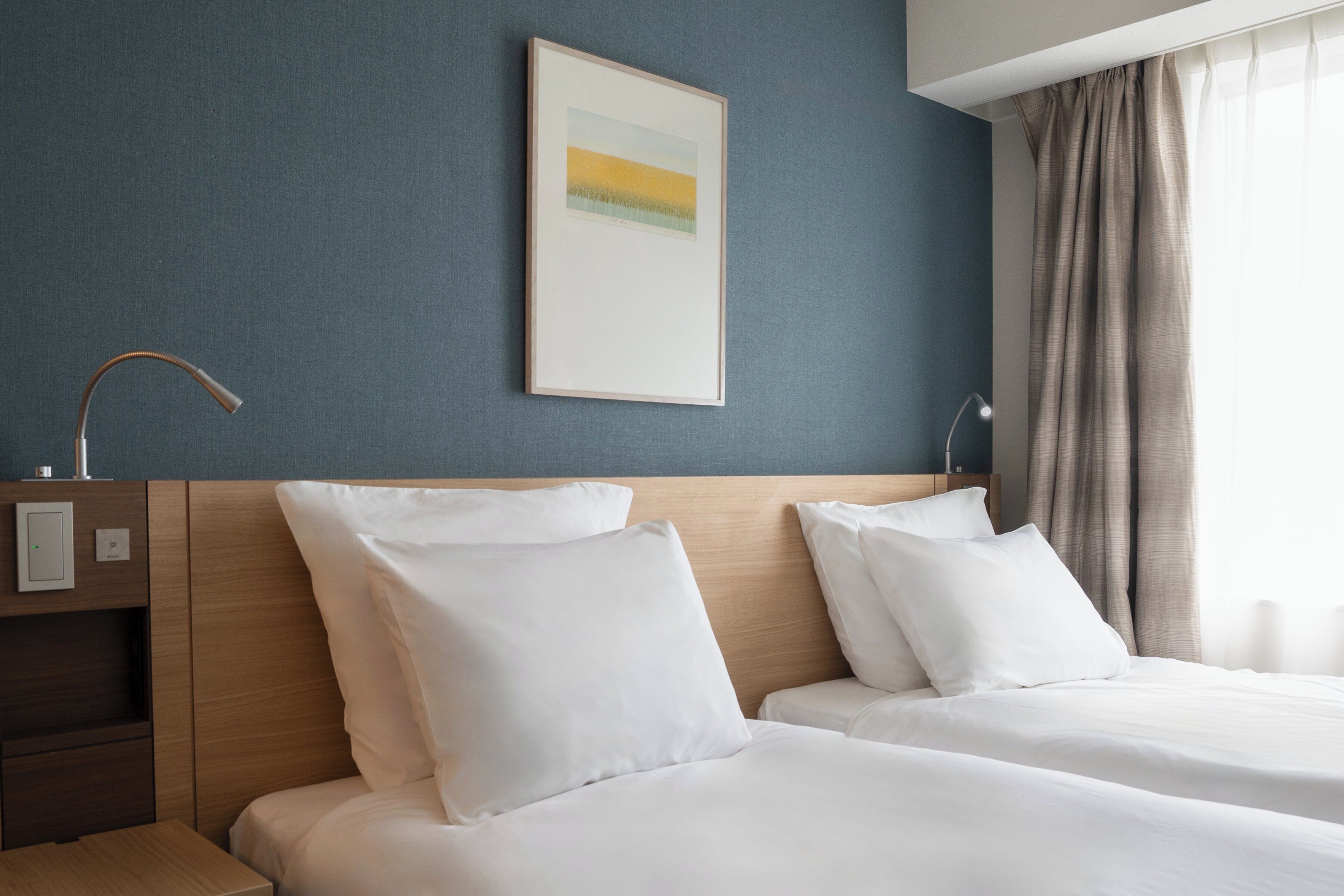 Rom – standard, 2 enkeltsenger, byutsikt | Sengetøy av topp kvalitet, dundyner, safe på rommet og skrivebord