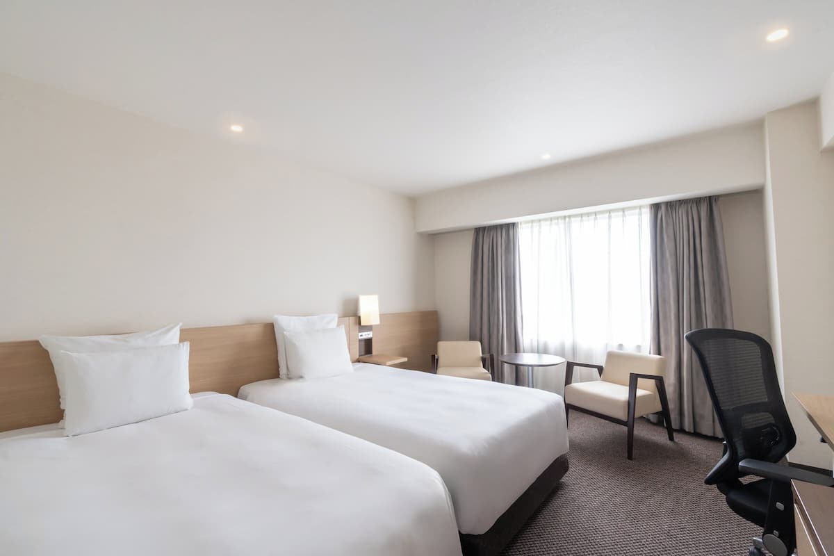 Premium Room, 2 Twin Beds | 1 bedroom, premium bedding, down comforters, in-room safe