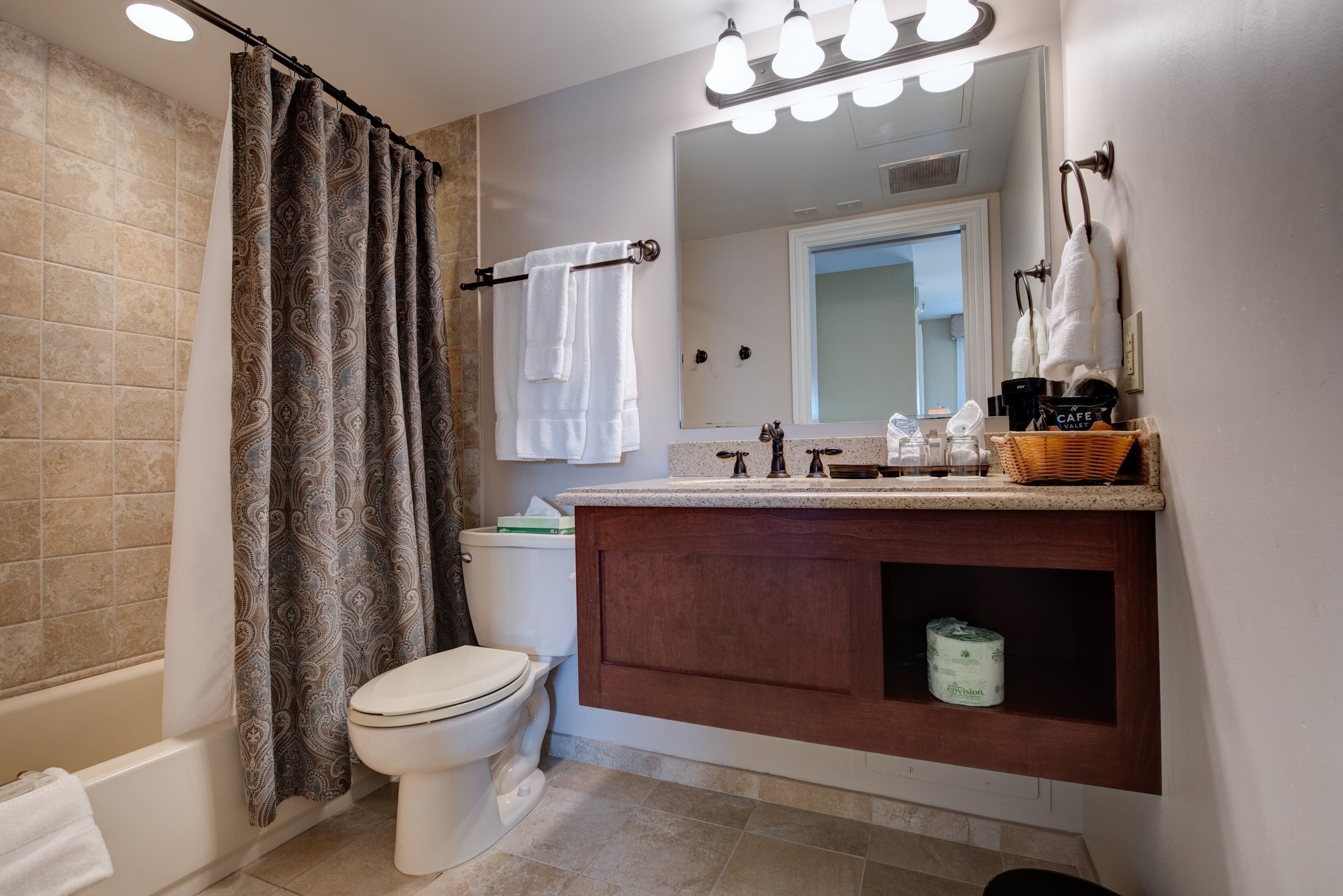 combined shower/bathtub, free toiletries, hair dryer, towels