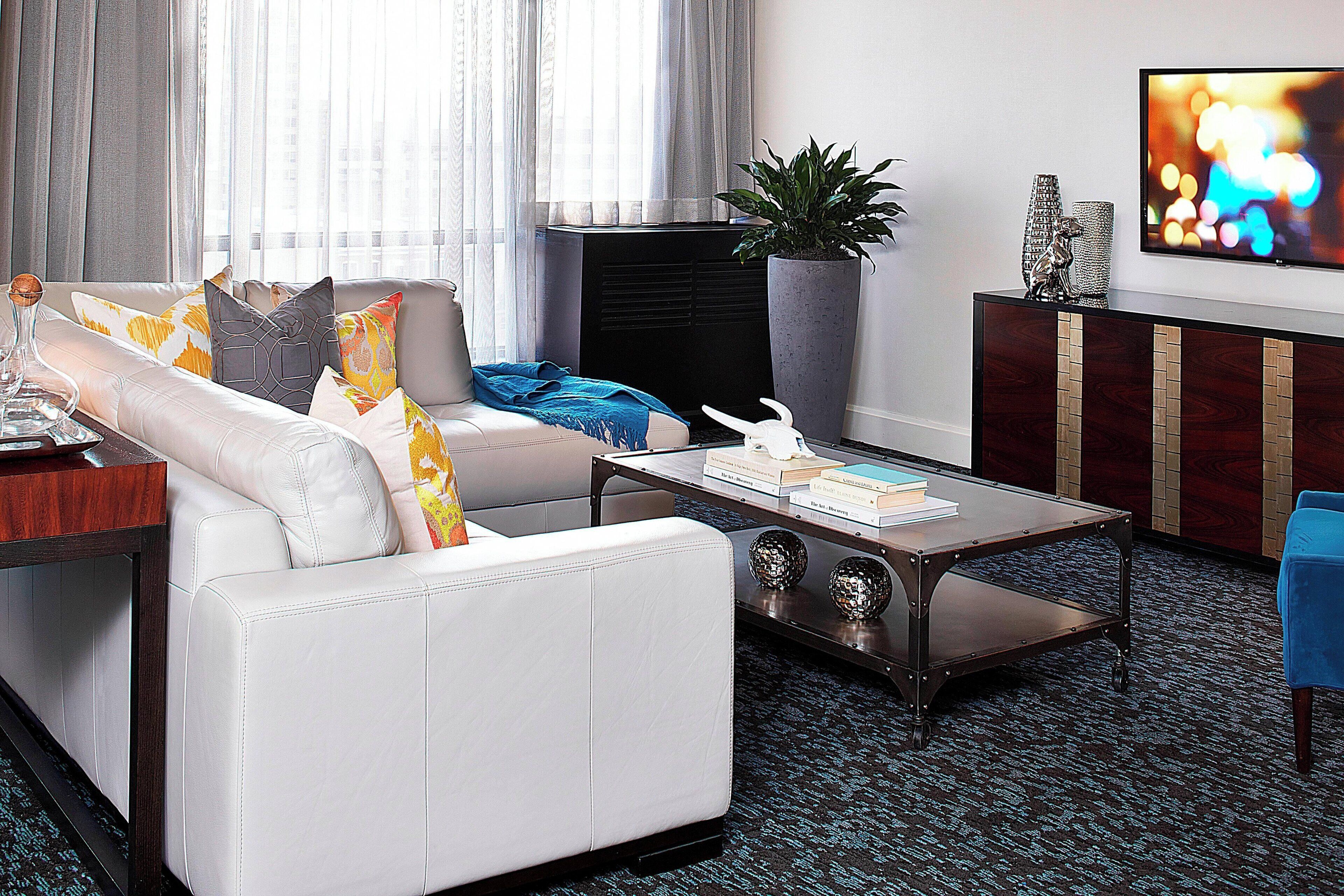 presidential suite, 1 bedroom | living room | 48-inch smart tv with cable channels, tv, netflix