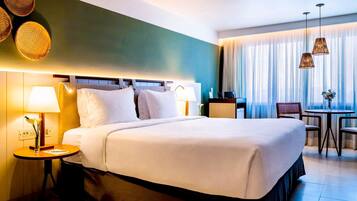 Deluxe Room, 1 King Bed | Minibar, in-room safe, individually decorated, desk