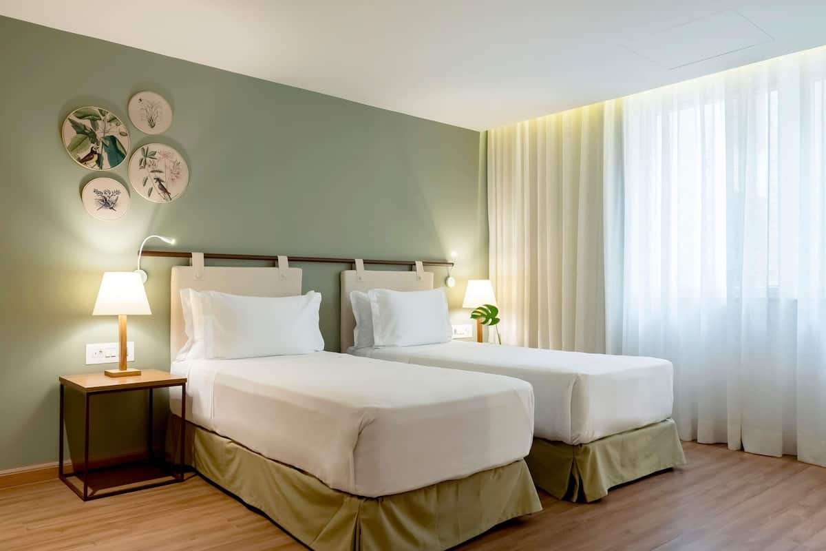Superior Room, 2 Twin Beds | Minibar, in-room safe, desk, laptop workspace