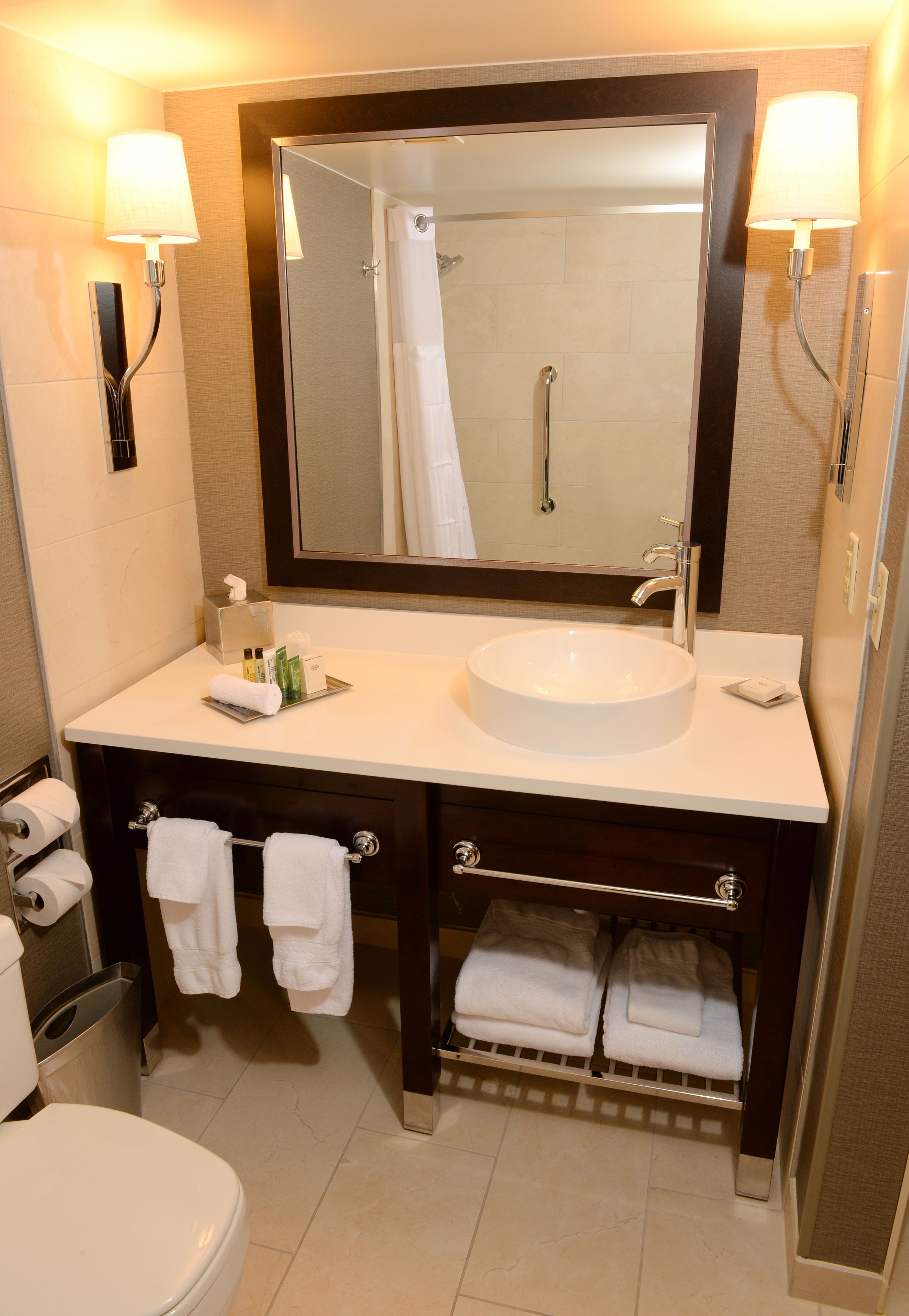 combined shower/bathtub, rainfall showerhead, designer toiletries