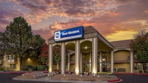A hotel with a sign reading "Best Western Albuquerque Airport InnSuites Hotel & Suites." - Best Western Airport Albuquerque InnSuites Hotel & Suites (Albuquerque)