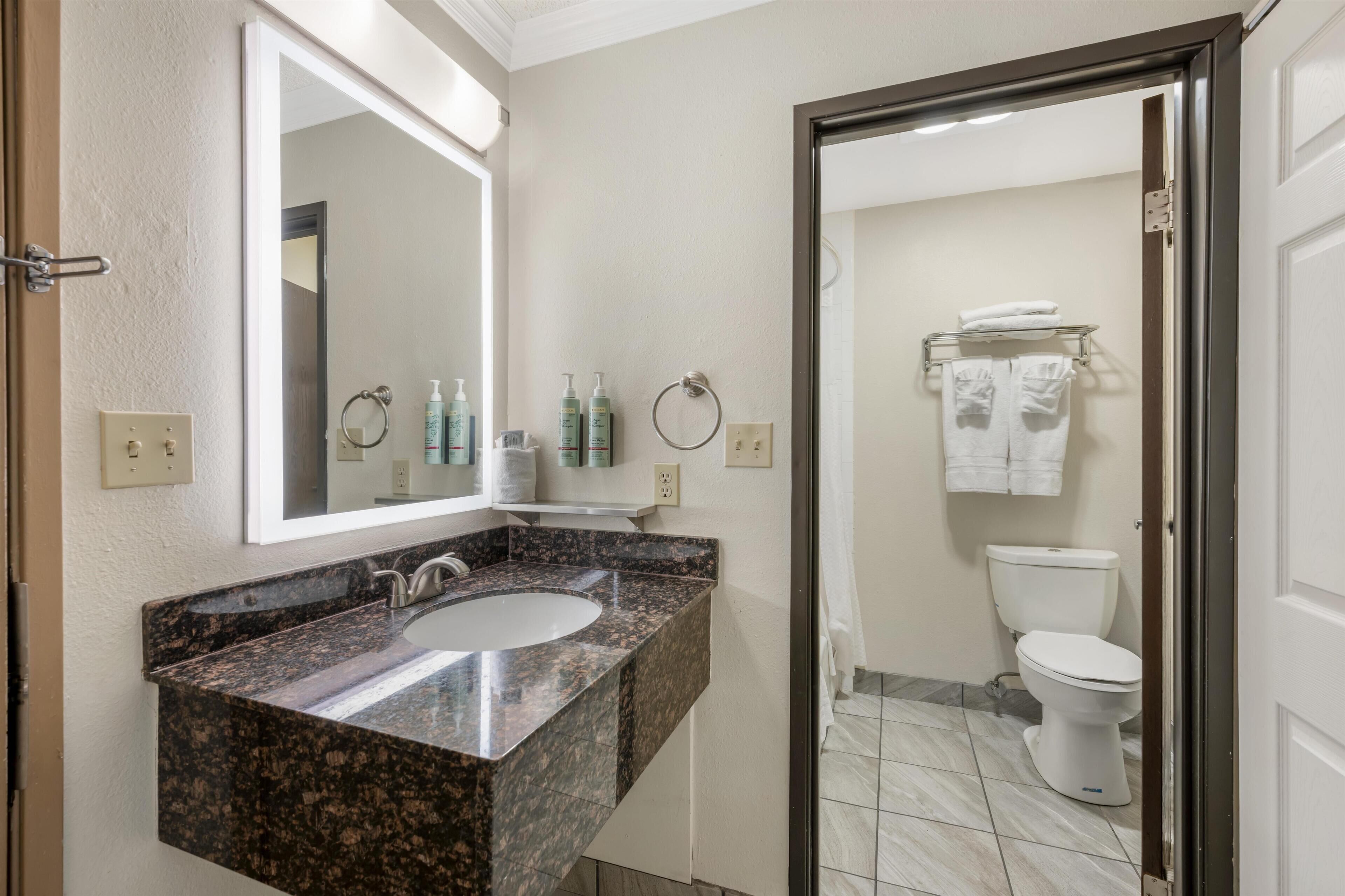 Standard Room, 2 Queen Beds, Non Smoking, Refrigerator & Microwave | Bathroom | Combined shower/tub, hydromassage showerhead, free toiletries