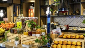 A breakfast buffet with various food items and beverages. - ibis Nanterre la Défense (Nanterre)